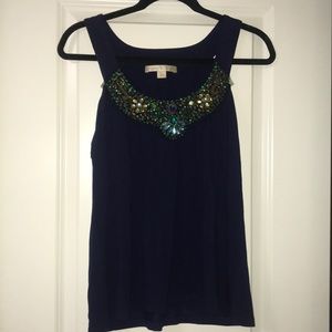 Embellished tank